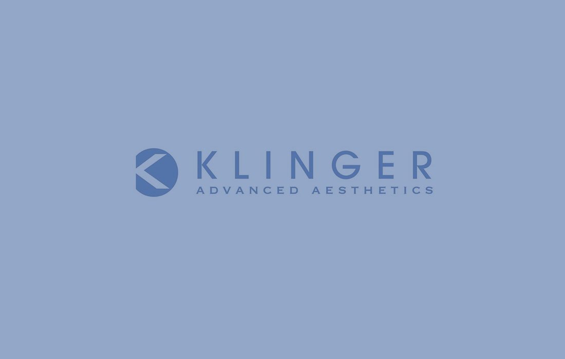 Logo of Klinger Advanced Aesthetics with blue background