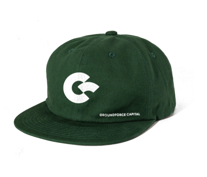 Green baseball cap with a white logo and the words 'Groundforce Capital' on the front.